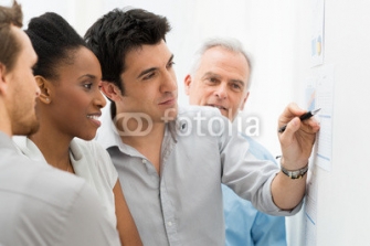 Business_Team_Analyzing_Graph.jpg